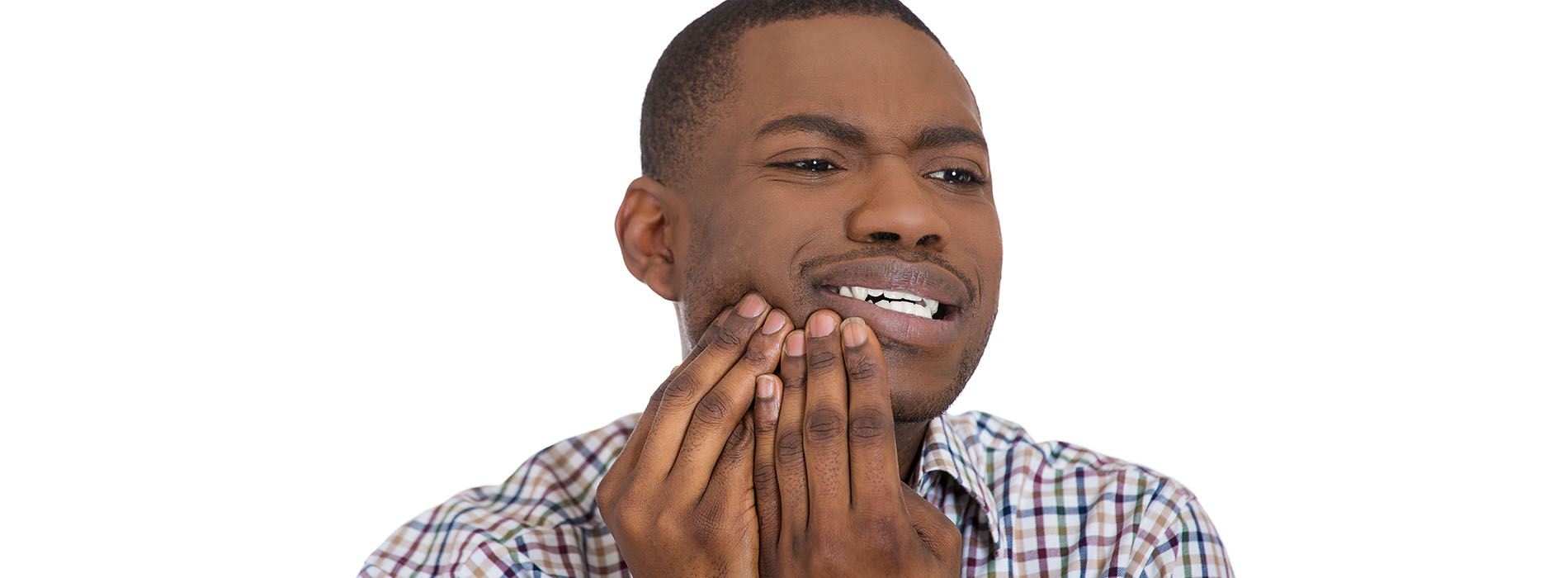 The image shows a man with his hand on his face, making a gesture that suggests he s either surprised or shocked. He appears to be indoors, possibly in front of a mirror.